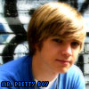 A person with light brown hair wearing a blue shirt appears in a static image with pixelated text at the bottom reading "MR. PRETTY BOY".