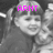 A grayscale image of a child with pigtails and bangs, overlaid with pink text reading 'ARNT' in the top-left