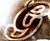 Animated contact sheet showing three frames of a stylized metallic logo with swirling text and decorative elements on a light background.