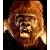 Pixelated image of a character with reddish-brown fur and an open mouth, next to green text reading "Original Icons .com" on dark background.