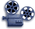 Blue film projector with two reels, one large and one small, on white background.