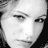 Static grayscale pixelated image of a person's face with visible facial features and hair, rendered in low resolution at 48x48 pixels.