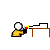 Pixelated character with white head and yellow body interacts with table, causing red-and-yellow object to rise from it.