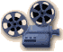 Four blue film projectors with two reels each, arranged in a on light gray background