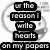 Black and white pixelated text blocks arranged vertically on a faint circular background, with three small heart icons at the bottom right.