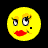 Static pixel art emoji with yellow face, stylized eyes, red lips, and a small black dot on the right cheek against a transparent background.