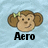 Pixelated monkey face with brown hair and green bow, smiling expression, light blue background, text labels below.