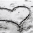Two heart outlines with a red text label 'JOE' on the right heart, set against a pixelated grayscale background.