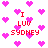 Pixelated pink hearts and red text reading 'I LUV SYDNEY' on a white background with animated heart and text variations.