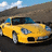 Yellow sports car on a road with mountains and clouds, next to red text reading "Shut up and Drive" above green and blue "Drive" texts.