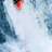 Animated sequence of a person in red and white kayaking gear paddling through turbulent blue water, captured from multiple angles.