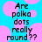 Pixelated text on a blue background with pink circular shapes, displaying the phrase 'Are polka dots really round??' in black block letters.