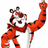 Pixelated orange tiger-like character with black stripes and white face markings raises one arm, next to pink text reading "I'm Grrrreat!" on a plain background.