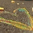 Animated icon with swirling yellow and green lines on a brown background, transitioning to a black-and-white heart outline on fabric.