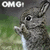 Pixelated image of a gray rabbit with large ears and black eyes, standing in front of green foliage under white text reading 'OMG!'