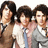 Three pixelated figures with dark hair stand side-by-side in formal attire against a white background.