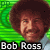 Pixelated image of Bob Ross with afro hair and light blue shirt, standing beside a tree on a green background with text overlays