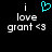 Pixelated text 'i love grant <3' on black background with cyan heart symbol above 'i' in left view, no heart in right view.
