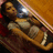 A pixelated image of a person lying in a coffin-like structure with red text overlay, showing animation changes between frames.