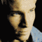 nine pixelated images showing a person with light hair in various poses against dark backgrounds, some frames include partial clothing details