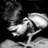 Animated grayscale icon of a stylized character with a large head and small body, showing sequential mouth and head movements with 'hated' text overlay.