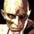 A pixelated animated sequence shows a bald figure with a stern expression, transitioning through three distinct poses against a black background.