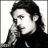 Four black-and-white show a person with long hair in different poses and expressions, each labeled 'GEEK' at the bottom left