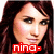 A pixelated image of a person with long brown hair, showing three variations of red text overlays: 'nina-', 'rbd-', and 'rebelde' in a