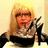 Pixelated image of a person with blonde hair holding a high-heeled shoe, with text reading SHOES!!!!!, LOL, and By Avery.