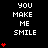 Pixelated text "YOU MAKE ME SMILE" repeats across a black background with red heart symbols in varying quantities per section.