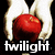 Two pairs of hands hold red apples against a black background, with text and symbols below.