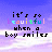 Pixelated text reads "it's so beautiful when a boy smiles" over a gradient sky background with cloud-like patterns.