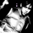 Pixelated grayscale anime-style character with dynamic pose, text overlays changing across frames from 'i' to 'love' and 'Pete <3', black background in top-left and bottom-left