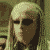 A pixelated animated sequence shows a character with long light hair and dark eyes shifting facial expressions