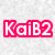 Two side-by-side pixelated text graphics: 'KaiB2' in white on pink background on left, 'Rulez!' in white on black on right with red and brown background.