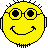 Two yellow pixelated smiley faces with black outlines, one smiling normally and the other sticking out a red tongue.