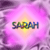 Pixelated text 'SARAH' in multicolored block letters over a pink and purple gradient background with a central yellow glow.