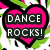 A pixelated heart-shaped icon with pink fill and black outline, containing text "DANCE ROCKS!" in white block letters on dark green backgrounds.