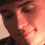 Four pixelated close-up views of a person's face in different poses and expressions arranged in a