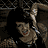 Pixelated character with dark hair and red lips in multiple poses, orange text reading "LAND OF THE DEAD" below.