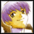 Pixelated anime-style character with purple hair and yellow skin holding a microphone against a white background, next to black with white text