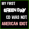 Static image of text on black background with green border, displaying 'MY FIRST GREEN DAY CD WAS NOT AMERICAN IDIOT' in white, green, and pink lettering.