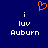 Blue background with white text 'i luv Auburn' repeated twice and an orange pixelated heart symbol above the left instance.