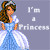 Pixelated image of a woman in a blue gown with white accents, brown hair, and a tiara, standing beside text reading "I'm a Princess" on a gray background.
