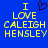 Blue background with yellow pixelated text reading "I LOVE CALEIGH HENSLEY" and a dark purple heart symbol above the word "LOVE".