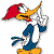 Pixelated cartoon character with red head, yellow beak, blue body, white chest, orange feet, and raised right hand against white background.