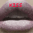Pixelated lips with red text 'KISS' on left and 'ME' on right, forming 'KISS ME' across the image.