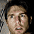 A 3x2 contact sheet of pixelated character faces from a movie, with central text reading "WAR OF THE WORLDS" and repeated website URLs on the right side.