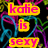 Pixelated text reads 'katie is sexy' in pink letters on yellow rectangles over a black background with colorful heart outlines.