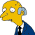 Yellow-skinned cartoon character with large nose, one eye closed, blue ear, blue suit, black tie, white shirt, pixelated rendering, side profile view